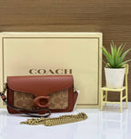Coach Tabby Wristlet In Signature Canvas