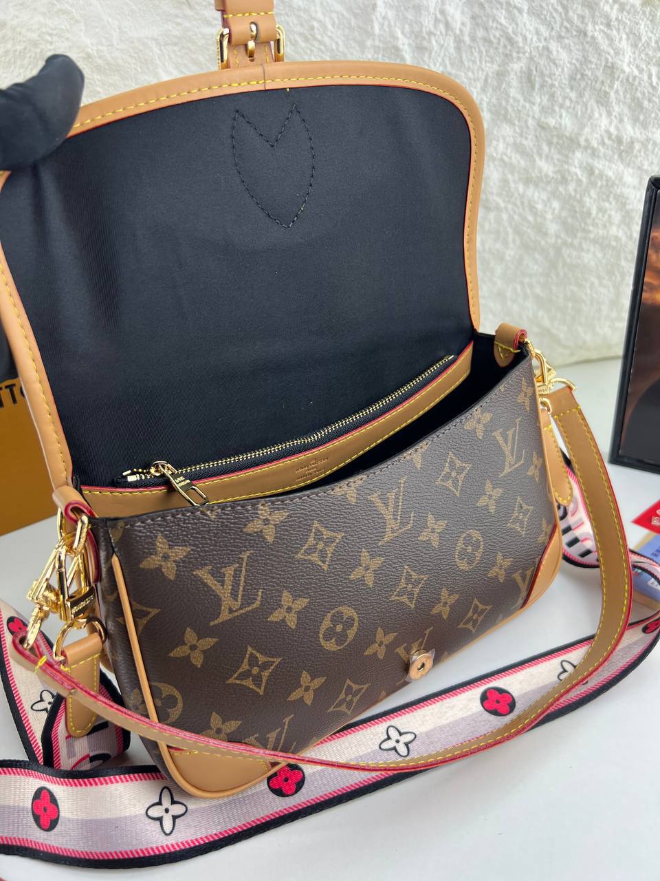 Louis Vuitton Diane satchel in Monogram canvas