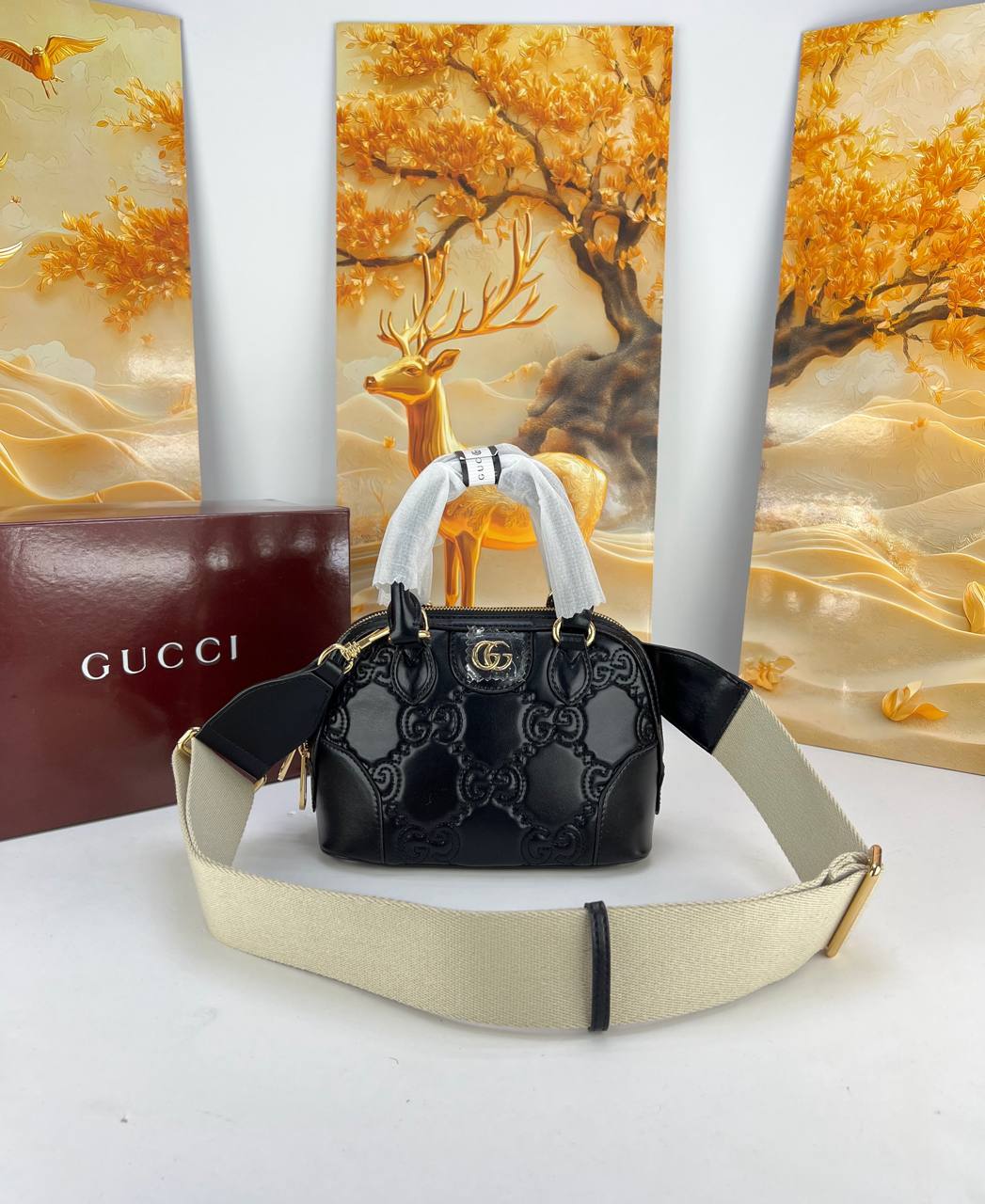 Gucci GG Matelassé Leather Mini Top Handle Bag