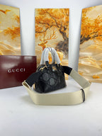 Gucci GG Matelassé Leather Mini Top Handle Bag