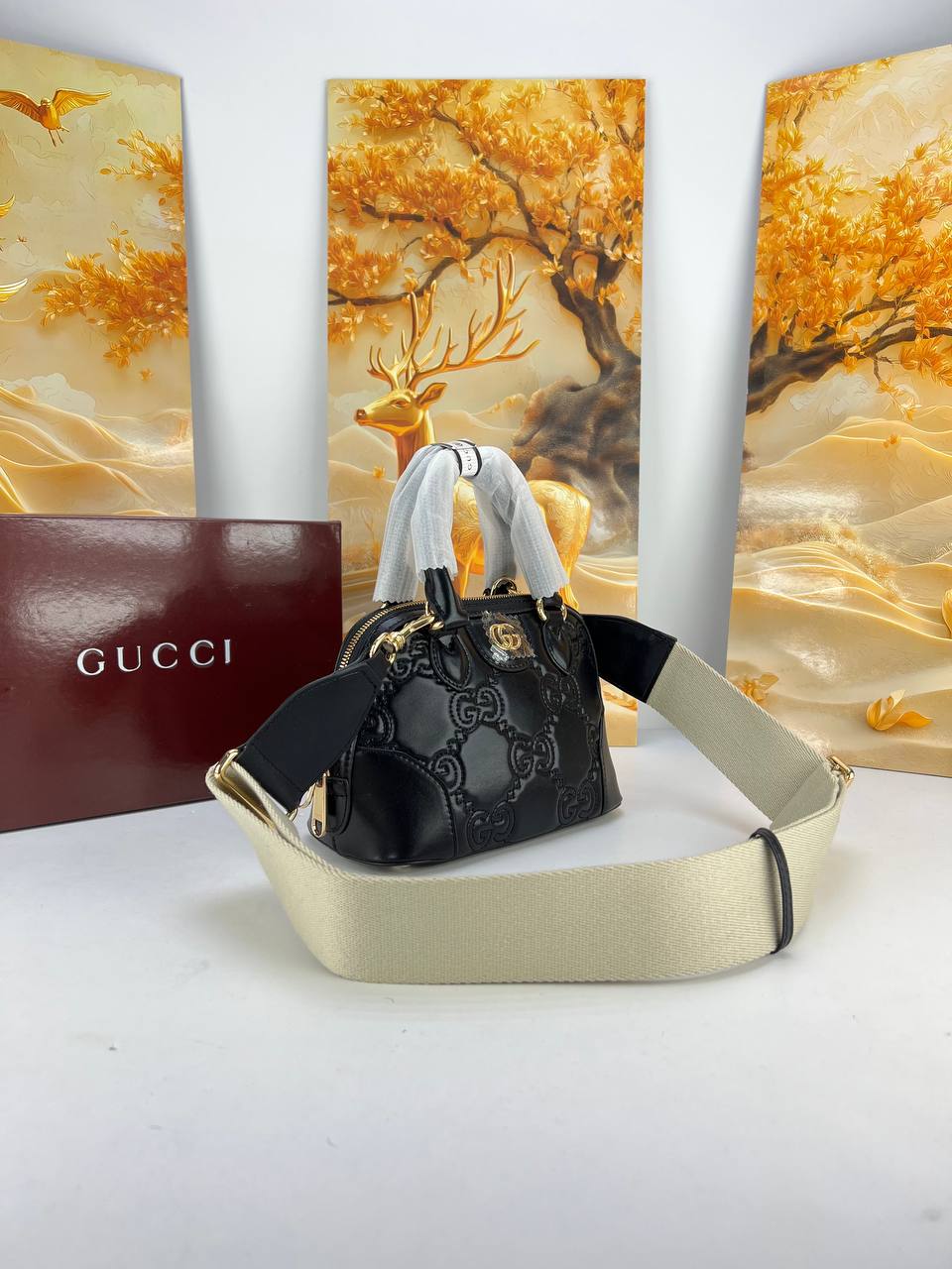 Gucci GG Matelassé Leather Mini Top Handle Bag