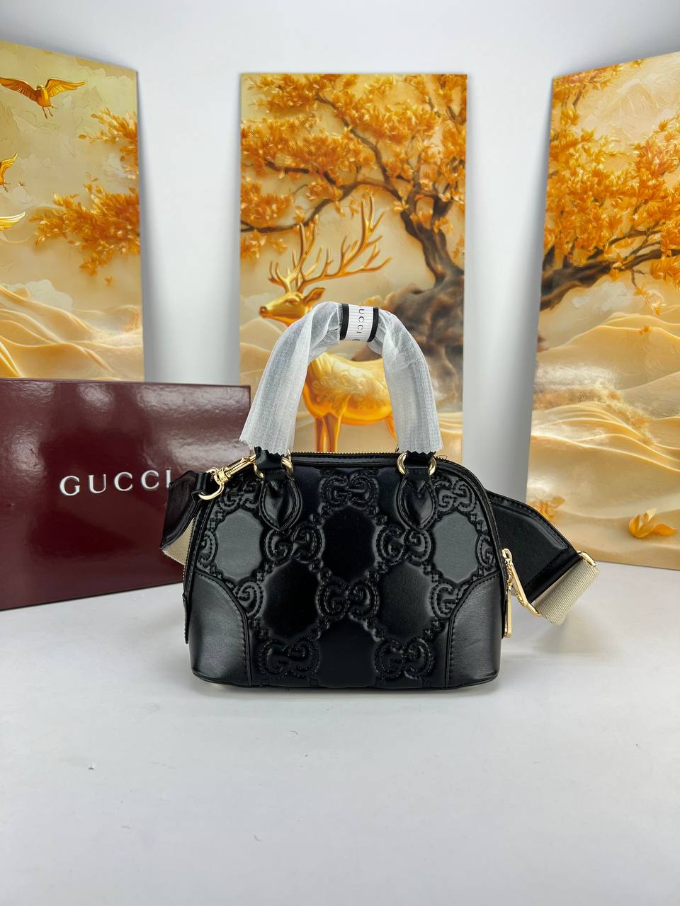 Gucci GG Matelassé Leather Mini Top Handle Bag