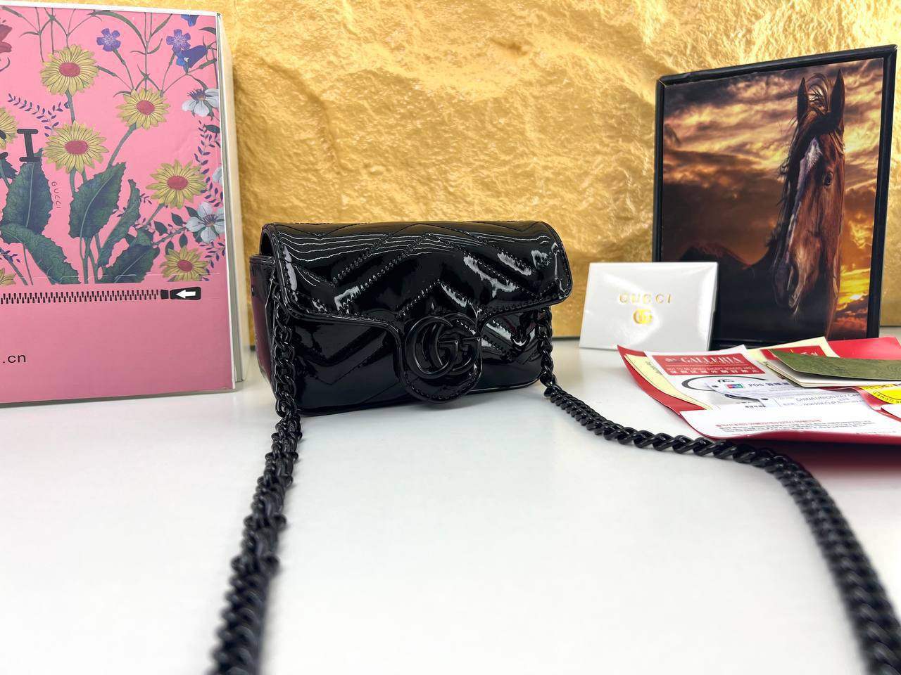 Gucci GG Marmont Monochrome Super Mini Bag in Black Patent Leather